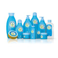 Penaten baby skincare products assortment in blue bottles and containers on white background.