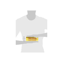 Person holding a large Toblerone chocolate bar, yellow packaging, 2.6 inch height shown