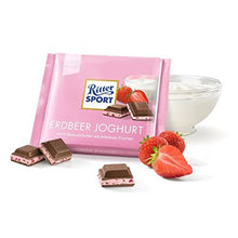 Ritter Sport Erdbeer Joghurt chocolate bar with strawberry yogurt filling, fresh strawberries, and yogurt bowl