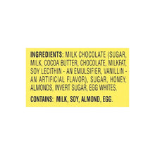 Milk chocolate candy ingredient label, lists milk, soy, almond, egg, cocoa butter, honey.