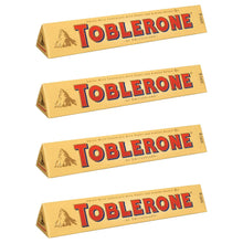 Four Toblerone Swiss milk chocolate bars with honey and almond nougat, 100g each, imported snack
