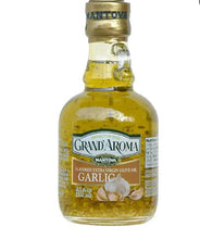 Bottle of Grand'Aroma garlic flavored extra virgin olive oil 250ml with garlic pieces