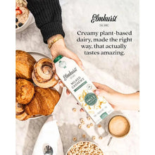 Elmhurst Milked Cashews plant-based dairy alternative with croissants and cereal, creamy vegan milk