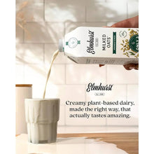 Elmhurst unsweetened oat milk being poured into glass, creamy plant-based dairy alternative