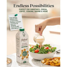 Elmhurst 1925 Milked Walnuts unsweetened plant-based milk poured over fresh kale salad, perfect for smoothies, cereal, coffee, cooking & baking