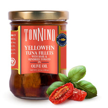 Jar of Tonnino yellowfin tuna fillets with basil and sundried tomato in olive oil on a white background