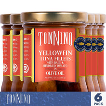Six jars of Tonnino Yellowfin Tuna Fillets with Basil and Sundried Tomato in Olive Oil, arranged in a pack of 6. The jars have gold lids and red-orange labels with white text, set against a white background with a blue and white 'TONNINO 6 PACK' banner at the bottom.