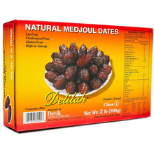 A 2 lb box of Delilah Natural Medjoul Dates, featuring a bright yellow and red packaging design with a photo of dates on a white plate and product details on the side.