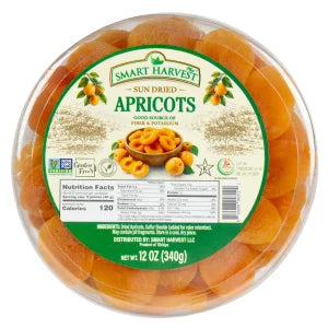 A 12 oz round plastic tub of Smarsh Harvest Sun Dried Aprots, showing the orange apricot pieces inside and a green and white product label on the front.