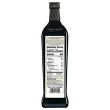 Black bottle of organic balsamic vinegar with nutrition facts label, grocery product