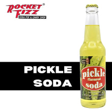 Pickle flavored soda in glass bottle, Lester's Fixins brand, yellow liquid, 12 oz