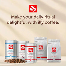 Assorted illy coffee tins and bags with coffee beans, featuring decaf, classico, and intenso blends.