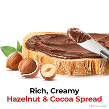 Creamy hazelnut cocoa spread on toast with whole hazelnuts, perfect snack or breakfast treat