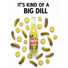 Pickle flavored soda bottle surrounded by whole and sliced dill pickles, quirky snack drink