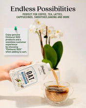 Elmhurst 1925 oat creamer poured into coffee, perfect for lattes, smoothies, and baking