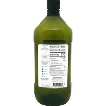 Back view of a green plastic bottle showing avocado oil nutrition facts and ingredient label