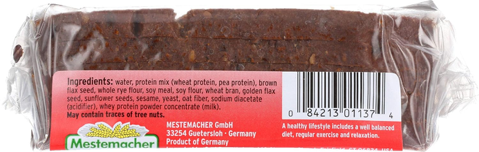 Packaged Mestemacher protein bread loaf with visible ingredients label and barcode