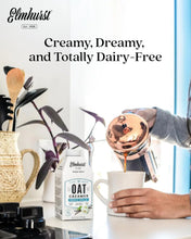 Elmhurst Oat Creamer French Vanilla, dairy-free plant-based creamer poured into coffee mug