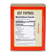 Hot Paprika spice in red tin with nutrition facts label, zero calories per serving, imported seasoning for cooking