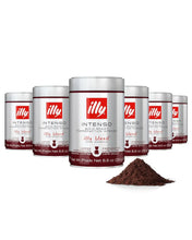Illy Intenso bold roast ground coffee cans and a pile of ground coffee, grocery product