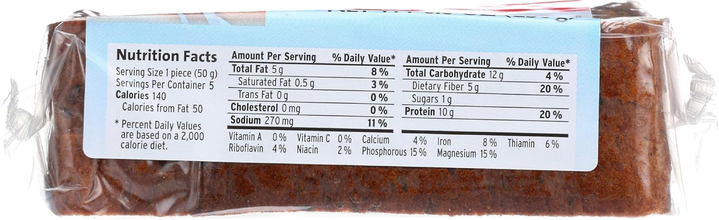 Nutrition facts label on packaged brown baked good, listing calories, fat, protein, and carbs.