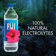 FIJI Natural Artesian Water bottle with pink hibiscus, 100% natural electrolytes, jungle backdrop