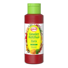 Hela Curry Spice Ketchup bottle with green cap, featuring herbs and spices on label for flavorful condiment