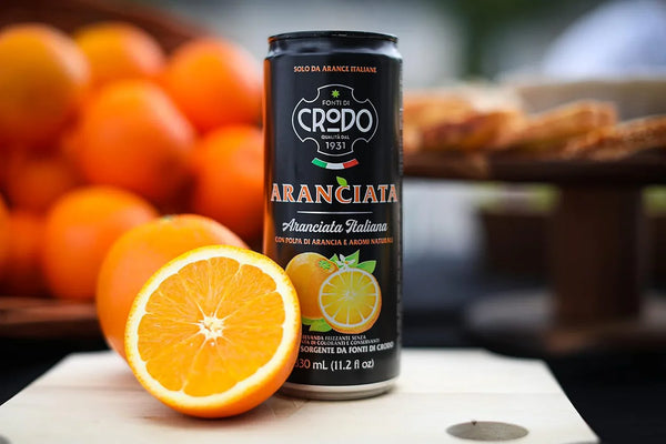 Crodos Italian orange juice can with fresh oranges, natural pulp, no additives — premium imported beverage