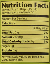 Nutrition facts label showing 5 calories, 210mg sodium, 1g carbs per 1 Tbsp serving