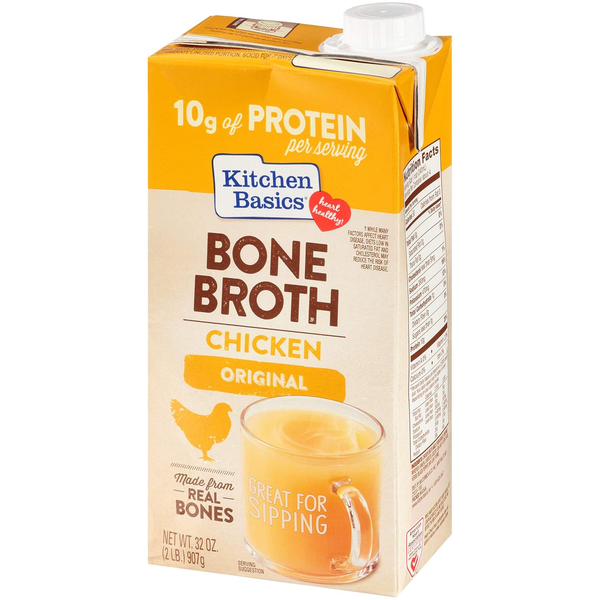 Carton of chicken bone broth original with nutrition label and glass mug, grocery product