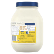 Large jar of mayonnaise with blue lid, product label and nutritional information visible
