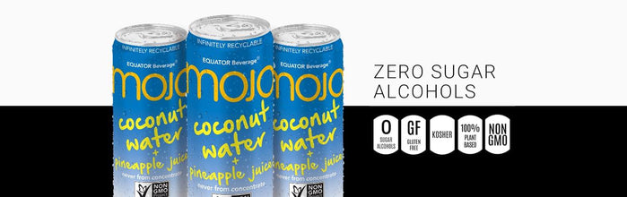 Cans of Mojo coconut water and pineapple juice with zero sugar, gluten-free, non-GMO labels