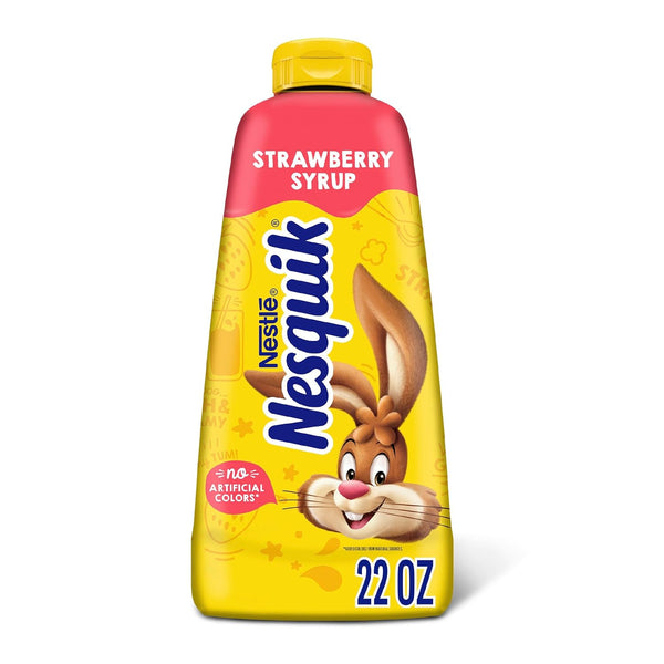 Nestle Nesquik Strawberry Syrup 22 oz bottle with bunny mascot on yellow background