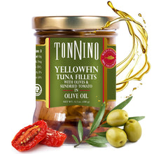 Jar of Tonnino yellowfin tuna fillets with olives and sundried tomatoes in olive oil, surrounded by ingredients.
