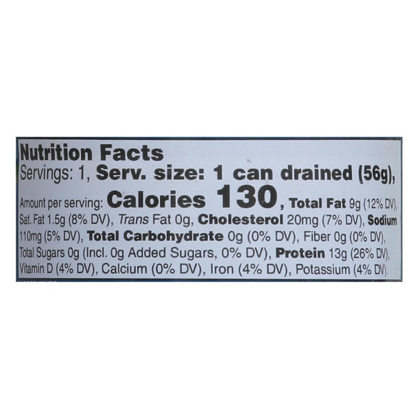 A Nutrition Facts label for a drained canned food product, showing calories, fat, cholesterol, sodium, sugars, and protein content per serving.