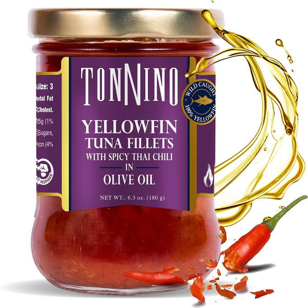 Jar of Tonnino yellowfin tuna fillets with spicy Thai chili in olive oil on a white background