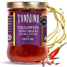 Jar of Tonnino yellowfin tuna fillets with spicy Thai chili in olive oil on a white background