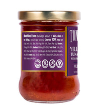 Jar of tuna salad with a purple label on a white background
